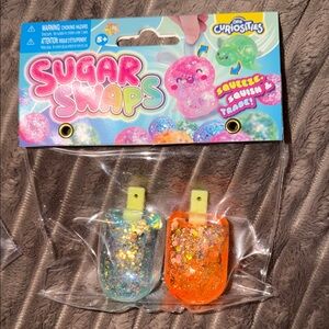 Sugar Swaps Glitter Squeeze Toys - Blue & Orange